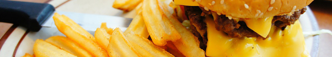 Eating Burger at Jake's Wayback Burgers restaurant in Voorhees Township, NJ.